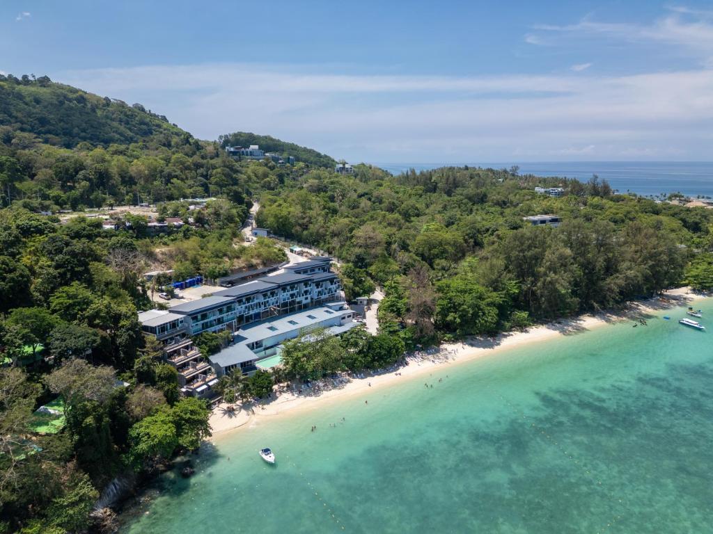 an aerial view of a resort on a beach at The Hideout Beachfront in Patong Beach