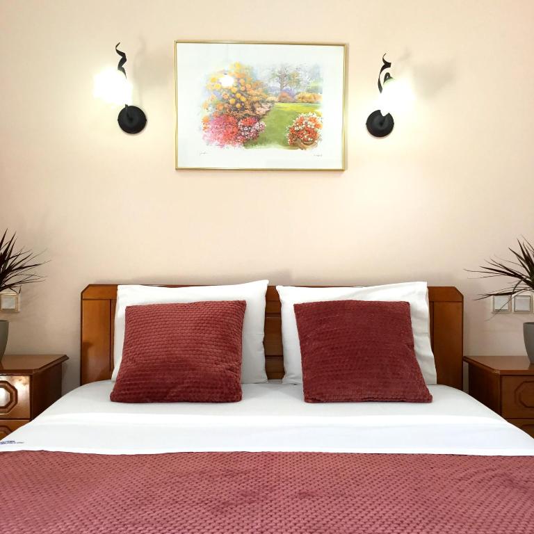 Postel nebo postele na pokoji v ubytování Hotel Triantafyllou