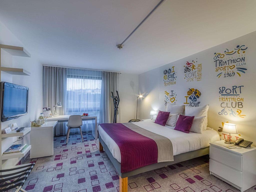 Posteľ alebo postele v izbe v ubytovaní Mercure Cieszyn