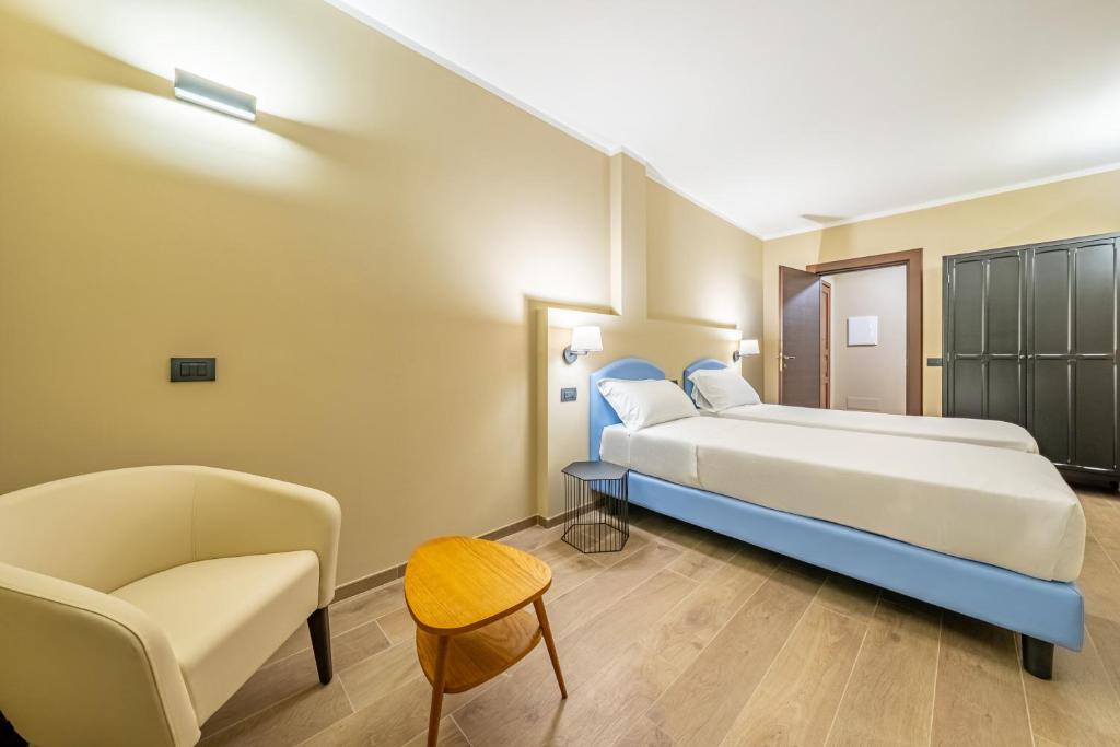 Postel nebo postele na pokoji v ubytování Motel Hotel Charlie