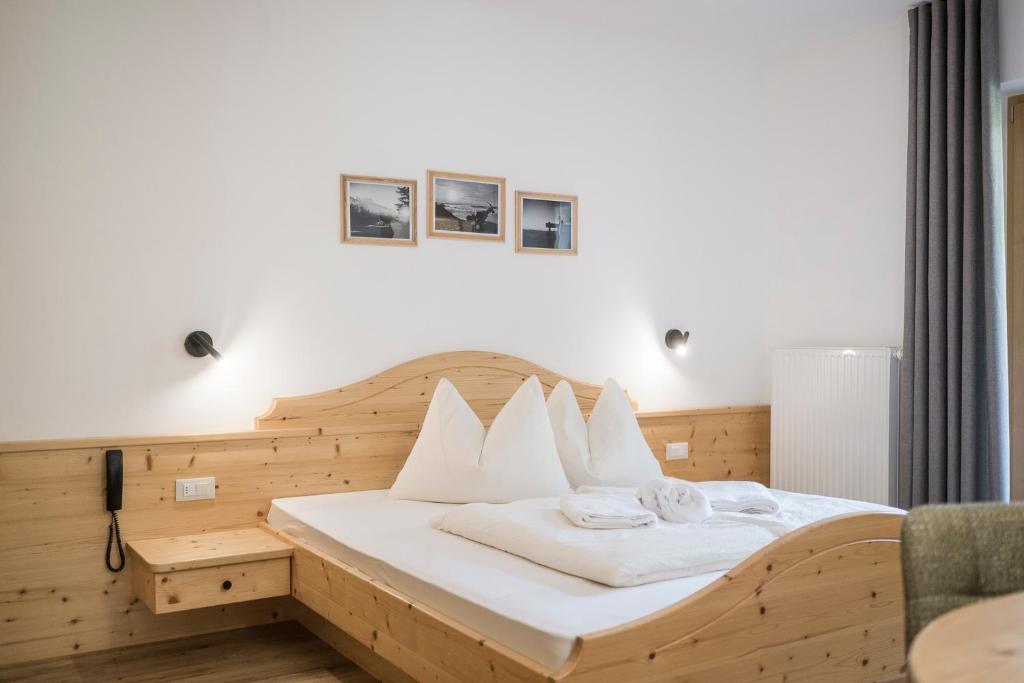Postel nebo postele na pokoji v ubytování Pension-Appartement Mitterhofer