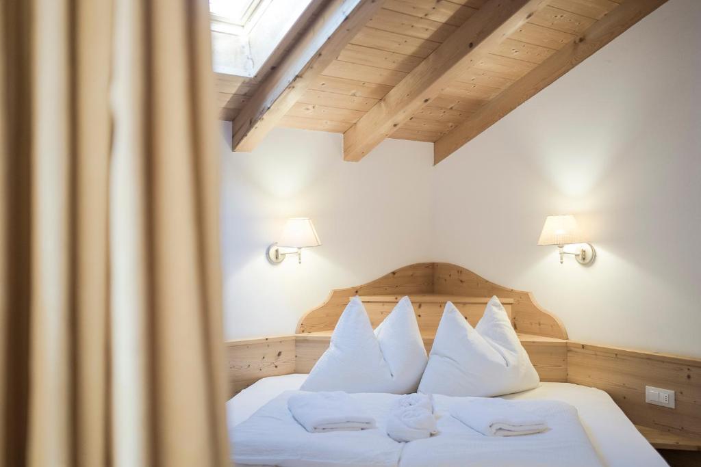Postel nebo postele na pokoji v ubytování Pension-Appartement Mitterhofer