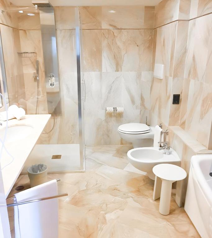 Koupelna v ubytování HOTIDAY Room Collection - Circeo