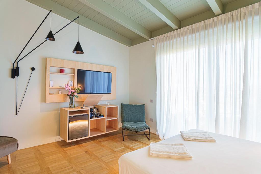 Postel nebo postele na pokoji v ubytování Uefio - Luxury Suites
