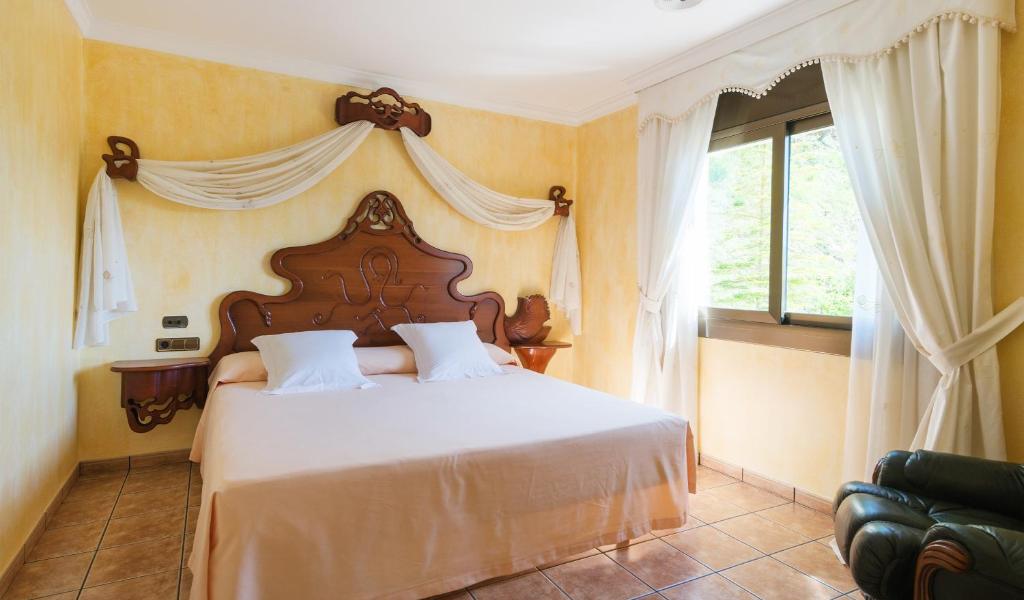 Posteľ alebo postele v izbe v ubytovaní Hotel Restaurant Cal Petit