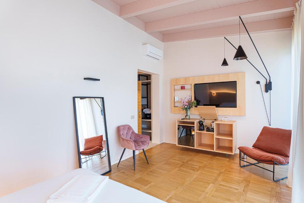 TV a/nebo společenská místnost v ubytování Uefio - Luxury Suites