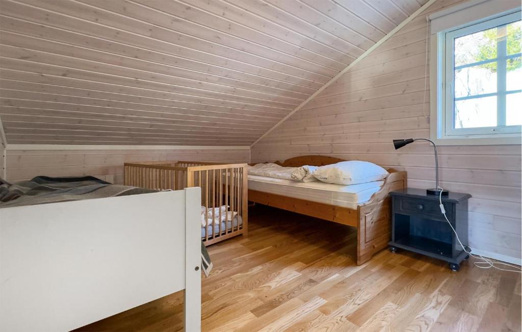 Postel nebo postele na pokoji v ubytování Three-Bedroom Holiday Home In Farsund
