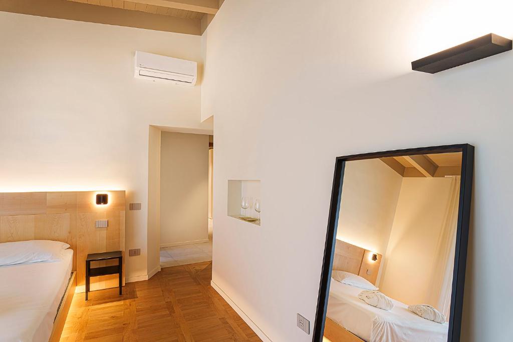 Postel nebo postele na pokoji v ubytování Uefio - Luxury Suites