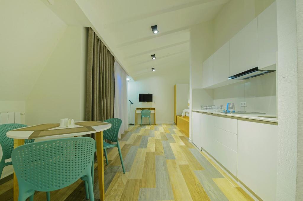 TV a/nebo společenská místnost v ubytování Mariinsky Boutique Hotel