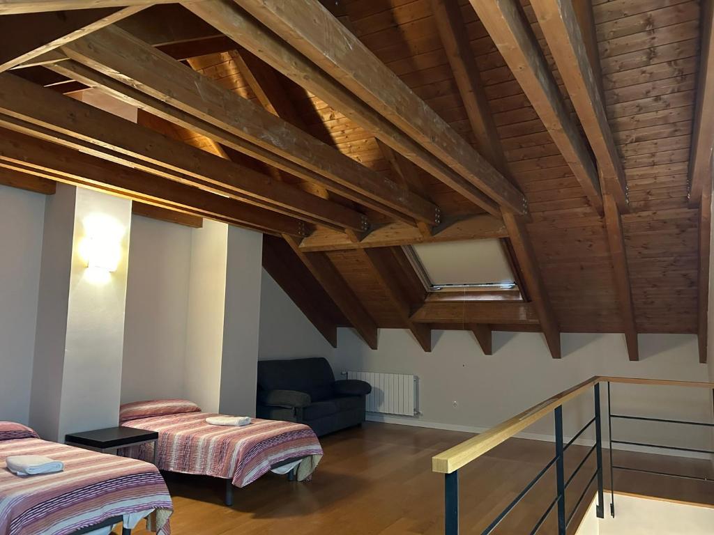 Postel nebo postele na pokoji v ubytování Residencial Massana