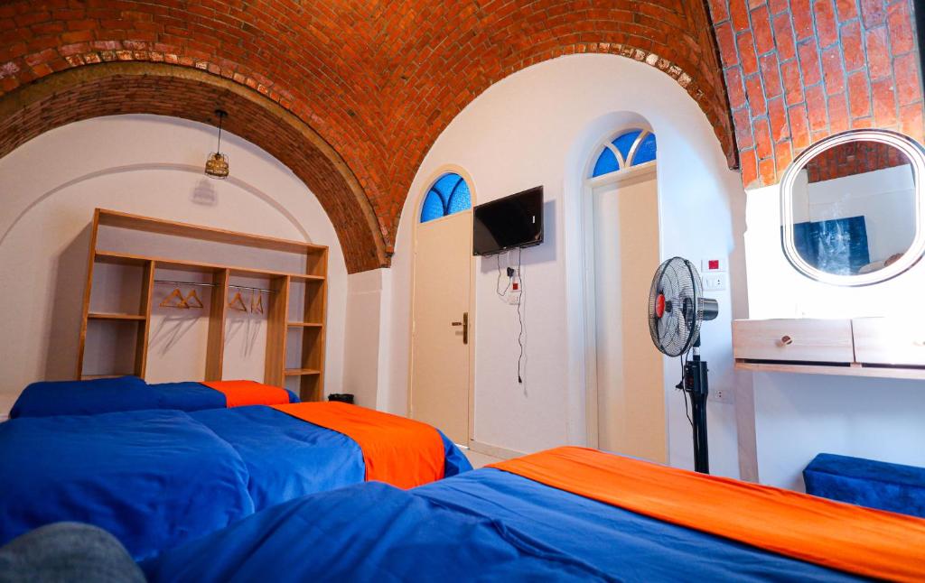 Postel nebo postele na pokoji v ubytování JAREEDY Guest house