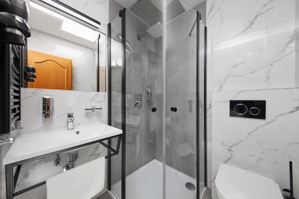 Koupelna v ubytování Hotel Nikolas
