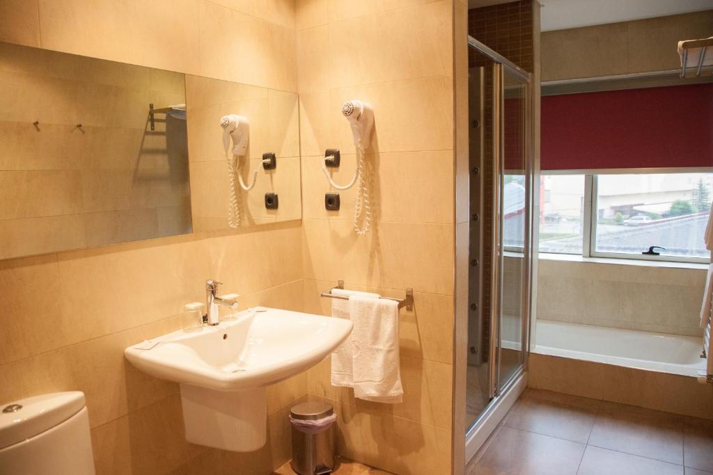 Koupelna v ubytování Hotel Izelai
