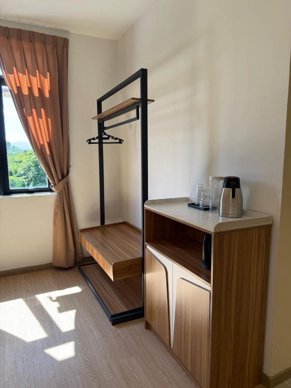 Postel nebo postele na pokoji v ubytování Hotel Ivory Papar