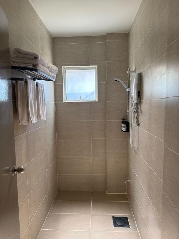 Koupelna v ubytování Hotel Ivory Papar