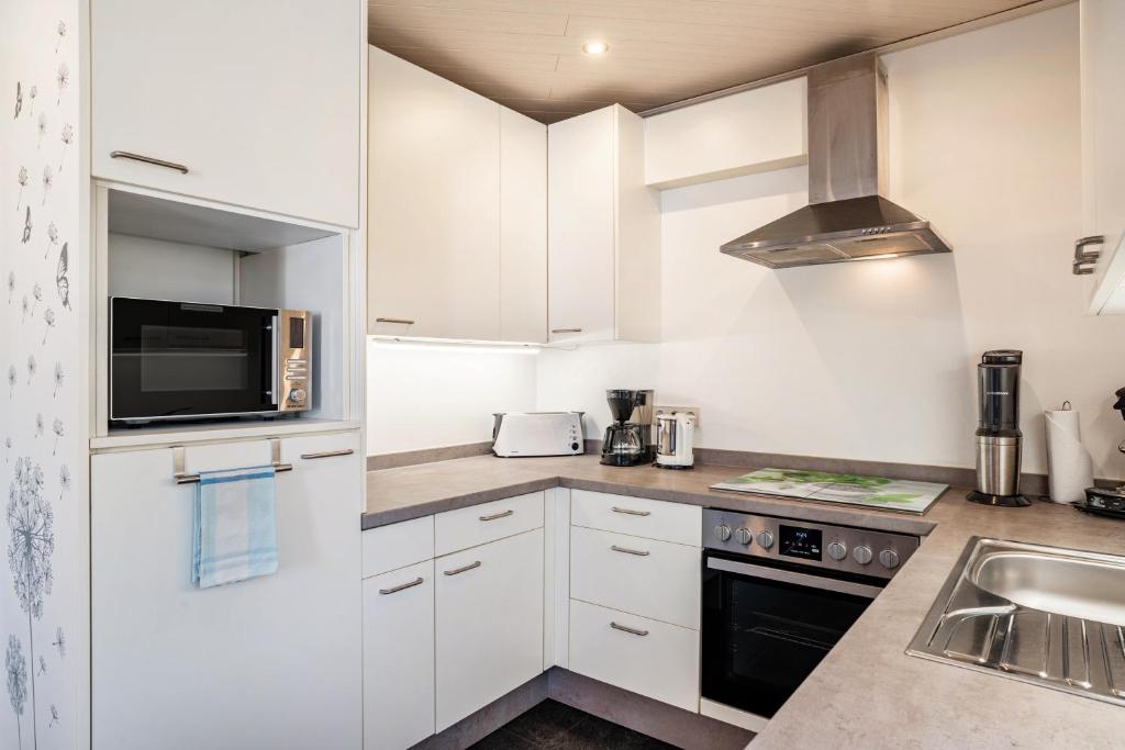 Kuchyň nebo kuchyňský kout v ubytování Ferienwohnung Huschle