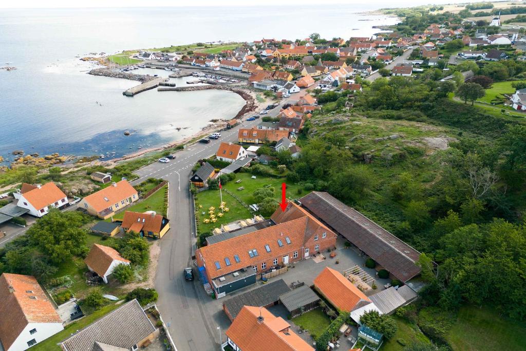 an aerial view of a small town next to the water at Holiday Apartment At Solgaarden 1 In Årsdale in Svaneke