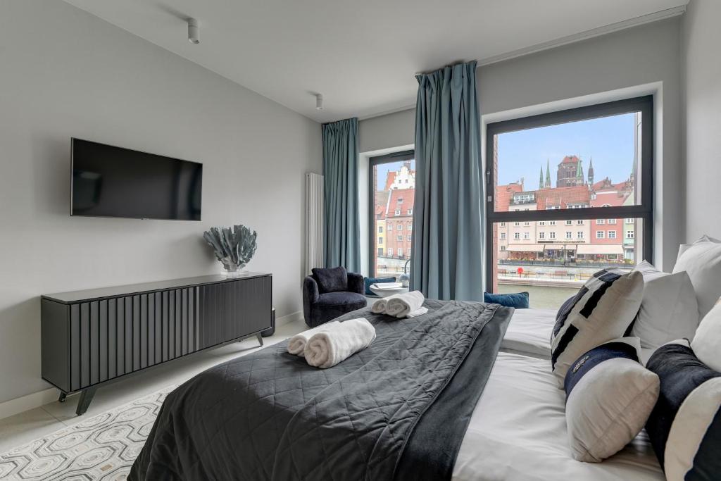 DEO PLAZA Premium Suites & Riverside by Downtown Apartments - 1