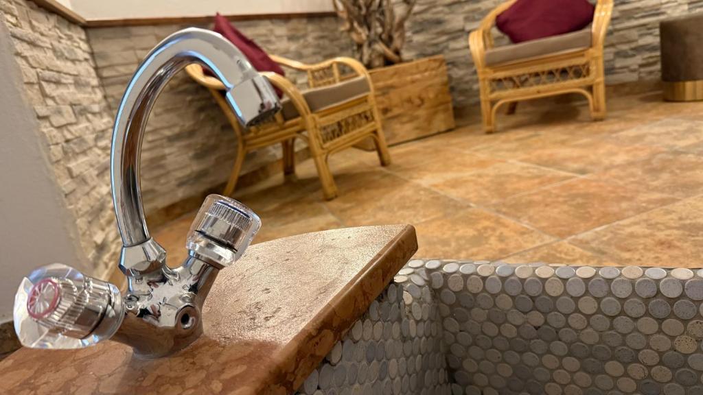 Posezení v ubytování Hotel Dorfgasthof Schlösslstube