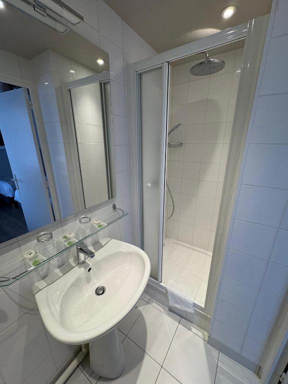 Koupelna v ubytování Hôtel Moderna