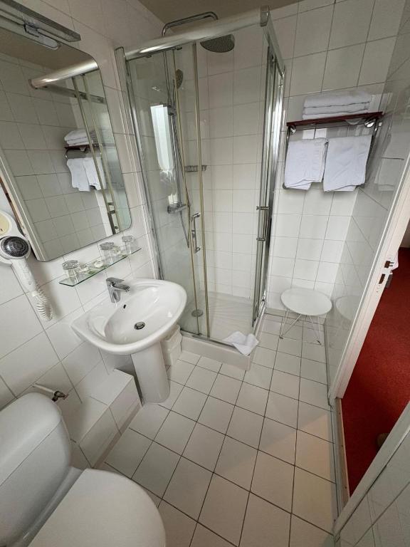 Koupelna v ubytování Hôtel Moderna