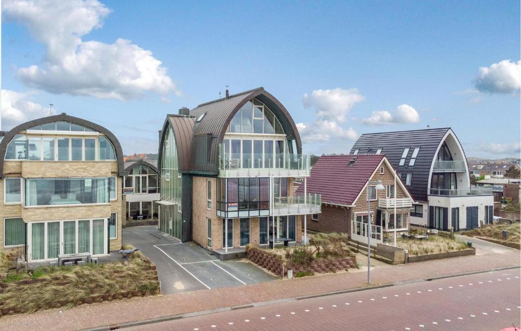 arial view of a building in a city at Sea Bass in Egmond aan Zee