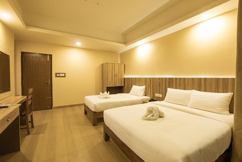 Katil atau katil-katil dalam bilik di Hotel Quest