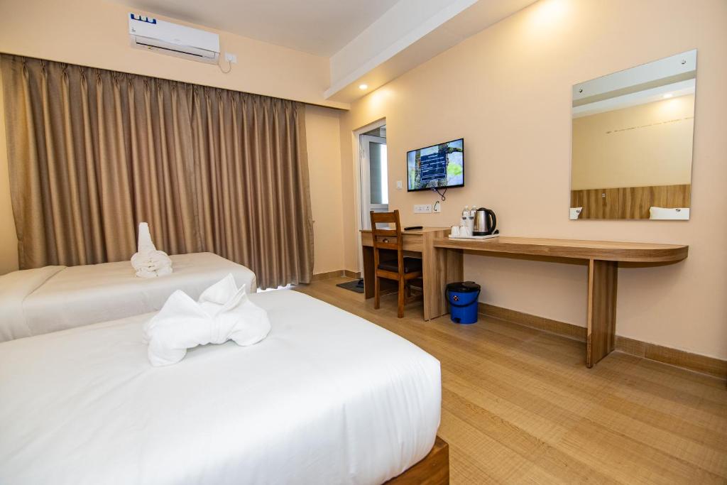 Katil atau katil-katil dalam bilik di Hotel Quest