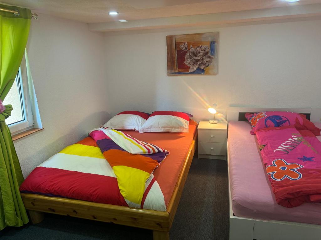 Postel nebo postele na pokoji v ubytování Fürsten Zimmer