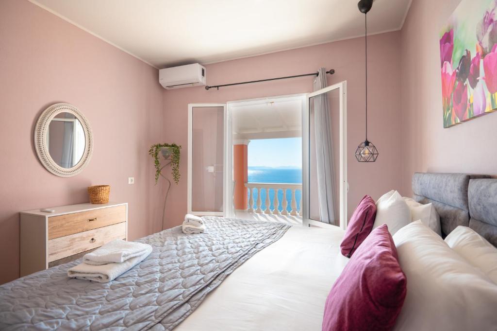 Posteľ alebo postele v izbe v ubytovaní Sunrise View Apartments