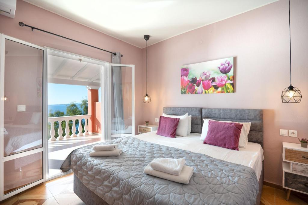 Posteľ alebo postele v izbe v ubytovaní Sunrise View Apartments
