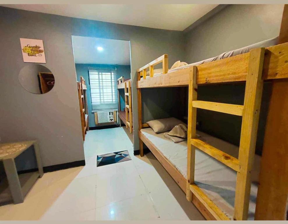 Postel nebo postele na pokoji v ubytování Mantilla Hostel