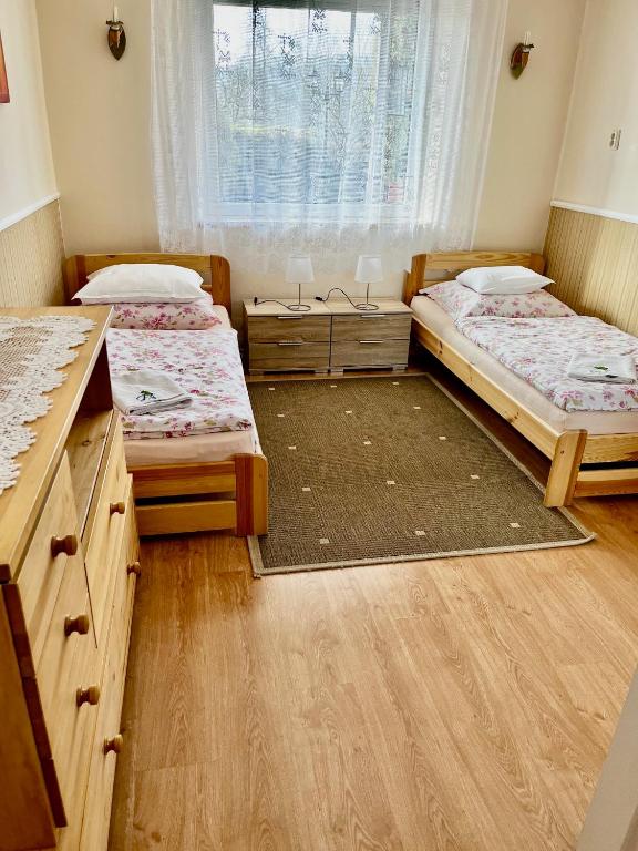 Postel nebo postele na pokoji v ubytování Vila Adéla - Teplice