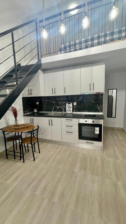 Kuchyňa alebo kuchynka v ubytovaní SKG Loft