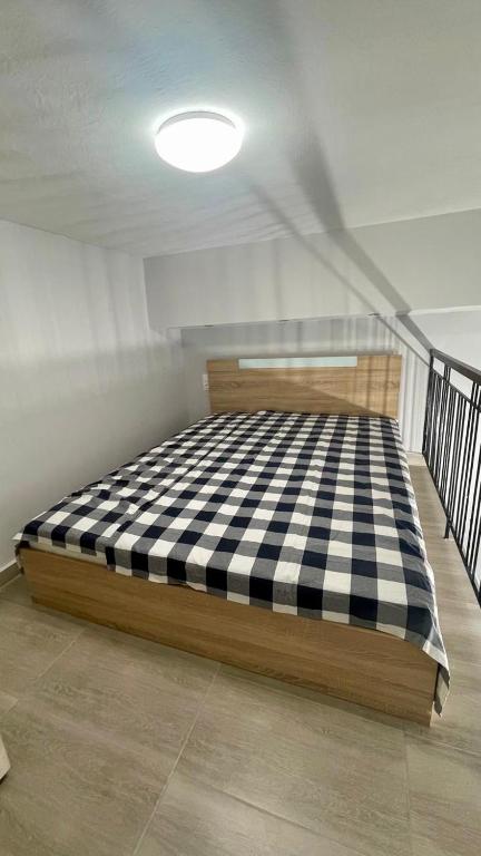 Posteľ alebo postele v izbe v ubytovaní SKG Loft