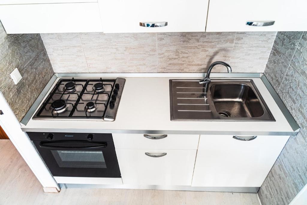 Kuchyň nebo kuchyňský kout v ubytování Condominio Sequoia