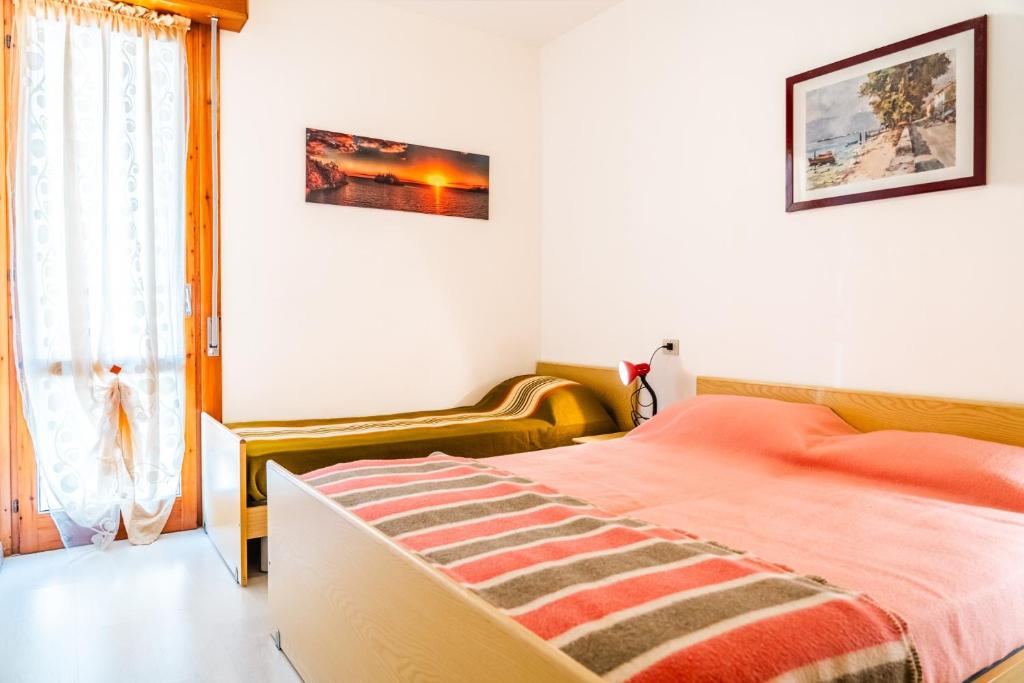 Postel nebo postele na pokoji v ubytování Condominio Sequoia