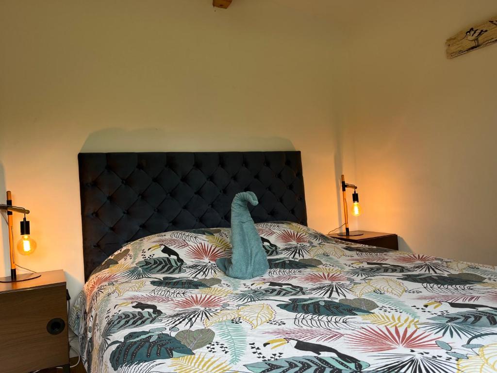 Postel nebo postele na pokoji v ubytování Le P’tit Bois Doré