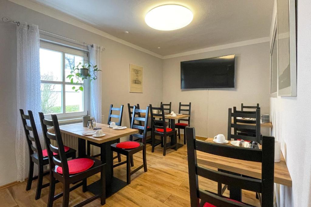 TV a/nebo společenská místnost v ubytování Hotel Wolke