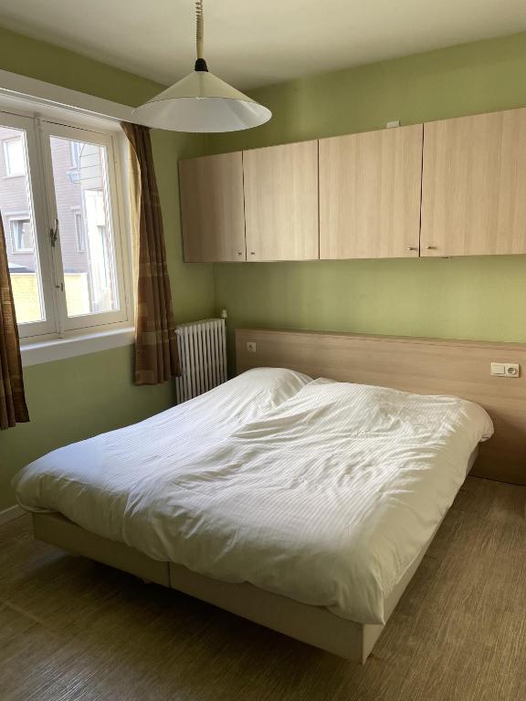 Postel nebo postele na pokoji v ubytování Logies De Wandelaar