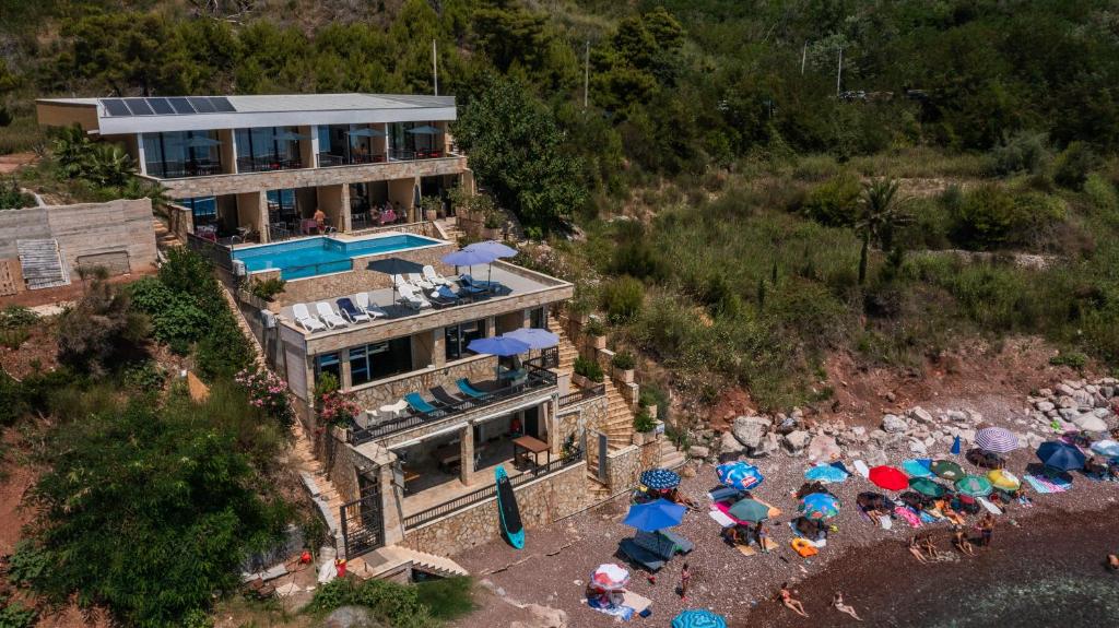 an aerial view of a house with umbrellas at Suites Castello in Bar