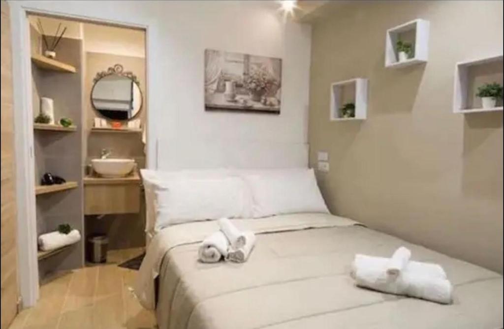 Ένα ή περισσότερα κρεβάτια σε δωμάτιο στο House Mezzocannone