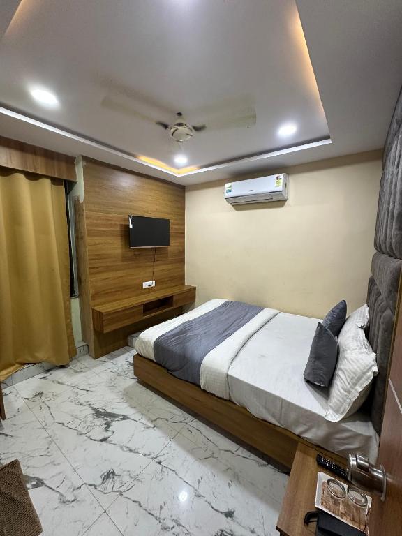 Postel nebo postele na pokoji v ubytování Hotel Royal King