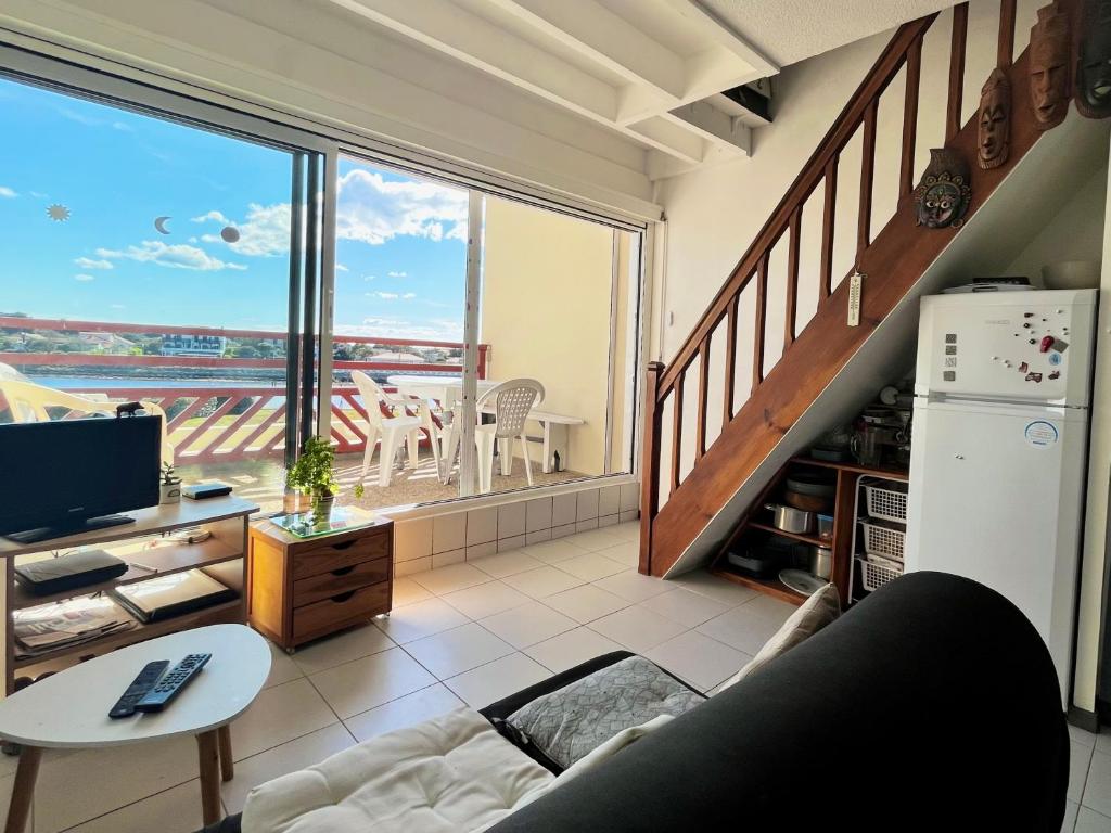 Photo de la galerie de l'établissement Bleu Courant - T4 avec balcon vue courant, à Mimizan-Plage