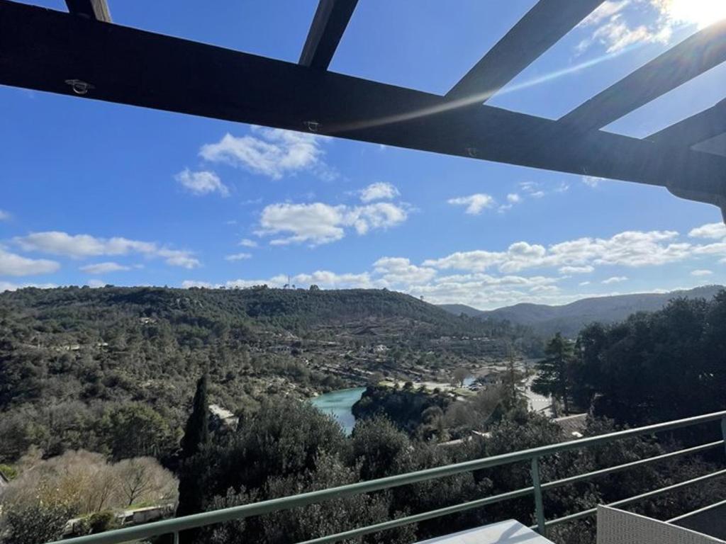 a view of a river from a balcony at Maison charmante près du lac d'Esparron, 2 chambres, parking - FR-1-822-10 in Esparron-de-Verdon