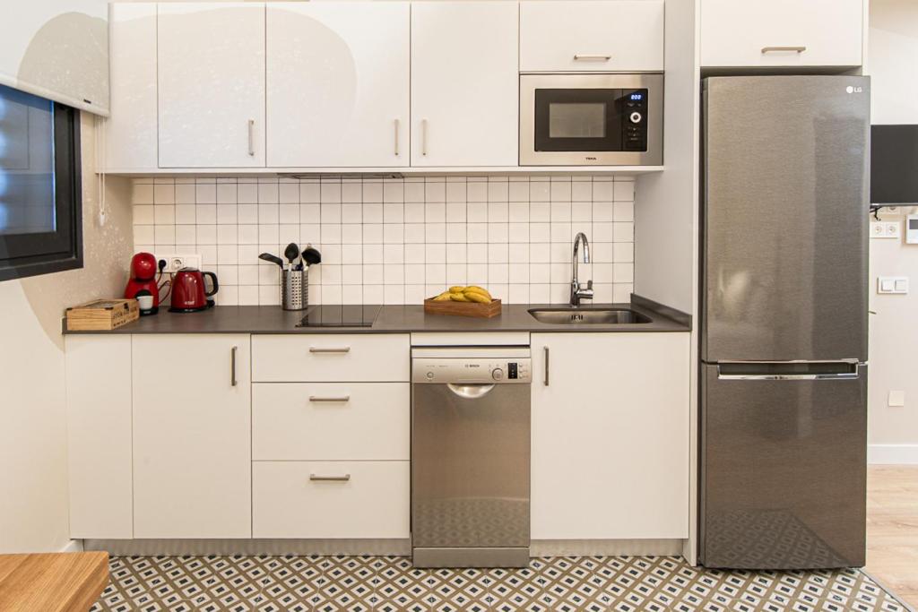 Kuchyňa alebo kuchynka v ubytovaní Barcelona Touch Apartments - Campalans