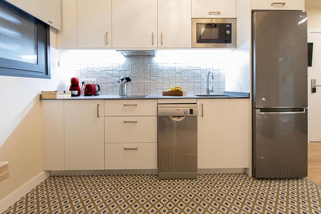 Kuchyňa alebo kuchynka v ubytovaní Barcelona Touch Apartments - Campalans