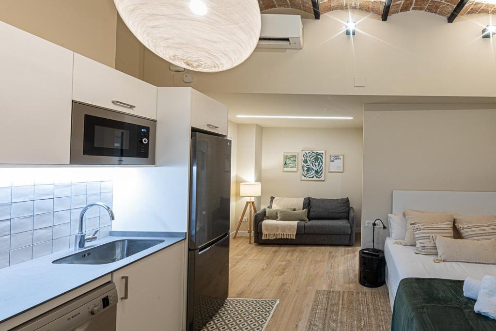 Kuchyňa alebo kuchynka v ubytovaní Barcelona Touch Apartments - Campalans