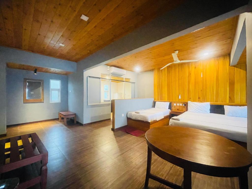 Postel nebo postele na pokoji v ubytování Suncoast Beach Hotel