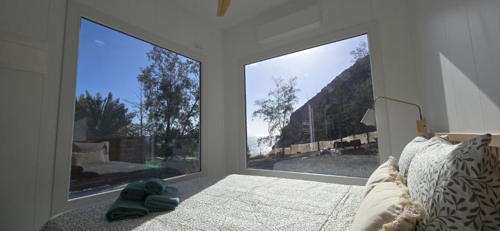 Cama o camas de una habitación en Blue Ocean Camp - Tasartico